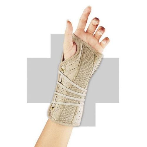 wrist wearing a FLA wrist brace suede in beige 