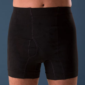 Close up of man wearing a Corsinel boxer, medium suppport in black.