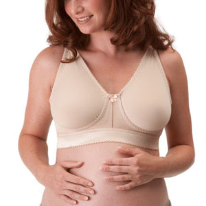 Model wearing champagne Design Veronique Wireless Contouring Support Bra Self Adjusting Cups