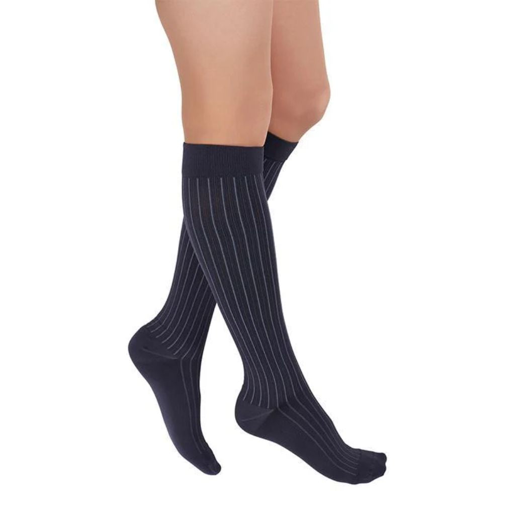 leg wearing medi rejuva high knee compression sock in freedom grey colour, side view
