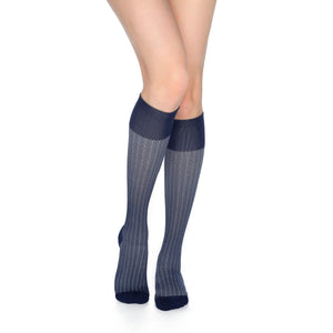 leg wearing medi rejuva high knee compression sock in herringbone colour, front view