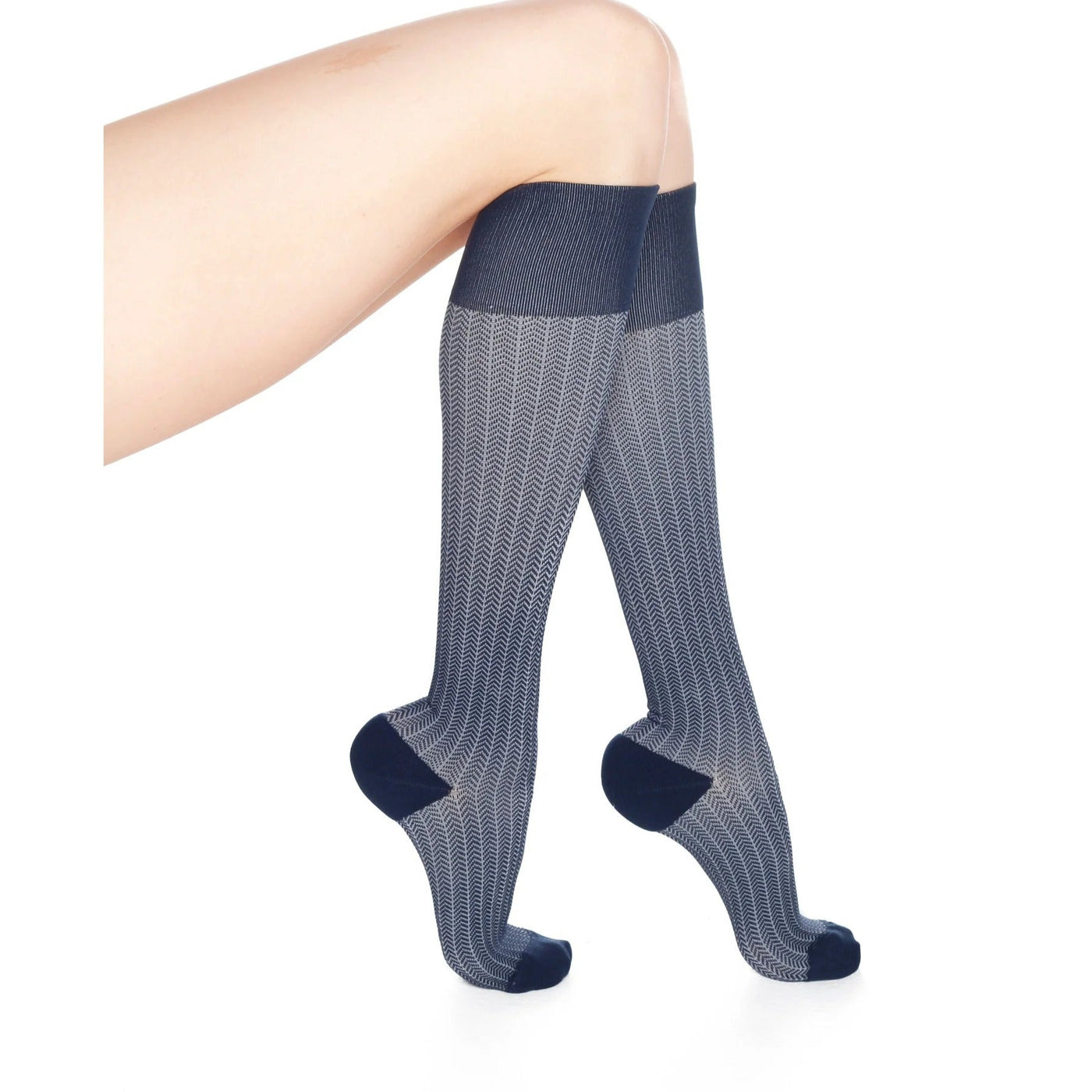 leg wearing medi rejuva high knee compression sock in herringbone colour, side view tip toeing