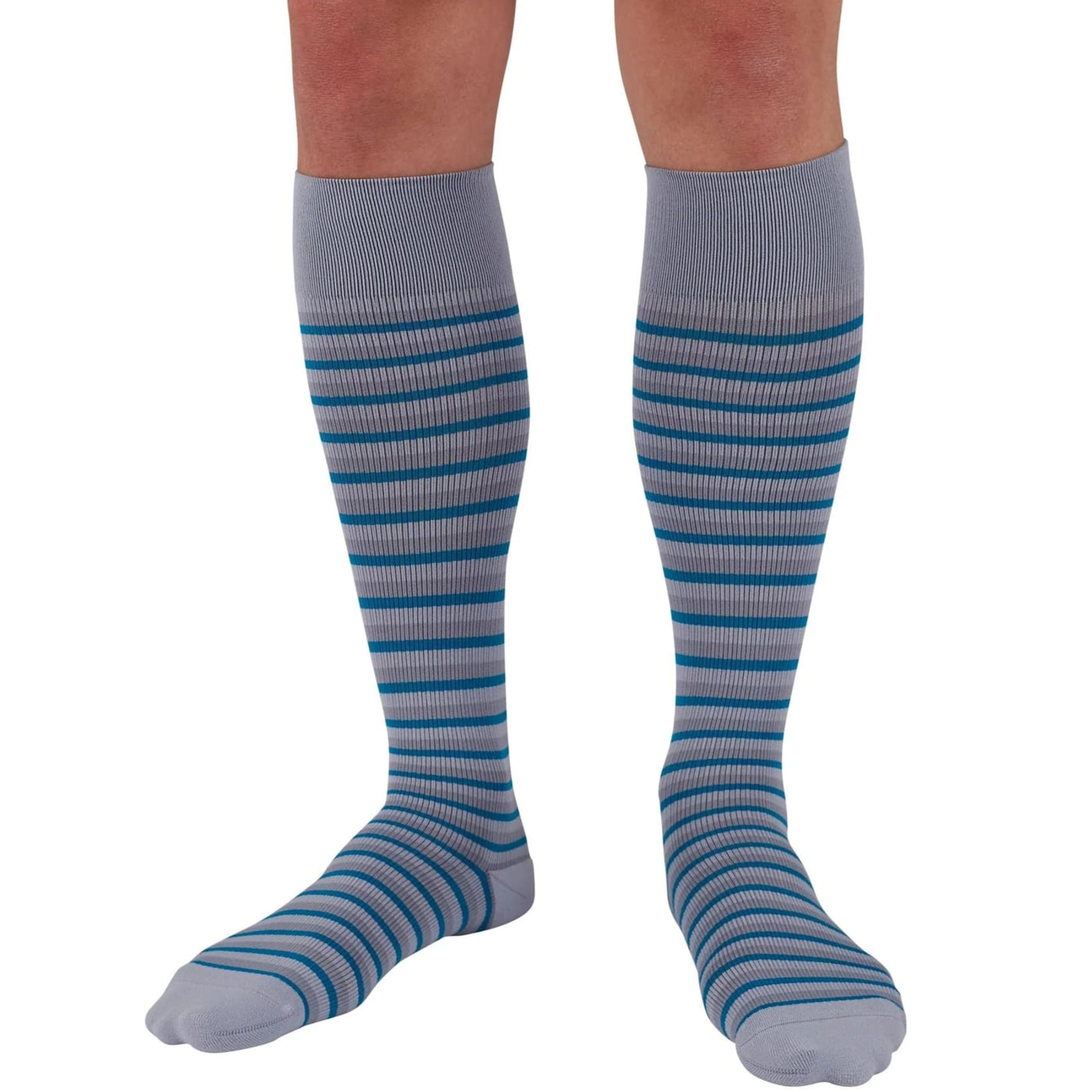 leg wearing medi rejuva high knee compression sock in stripe grey and teal, front view