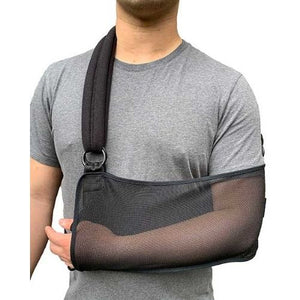 man wearing the ortho active arm sling shoulder immobilizer