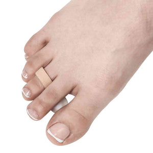 Top view of foot model wearing the Pedifix Hammer Toe Crest Adjust-A-Loop Visco-GEL.