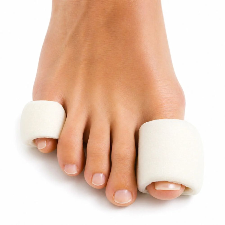 Close up of foot from top view wearing the Pedifix Toe Foam Tubular Bandages