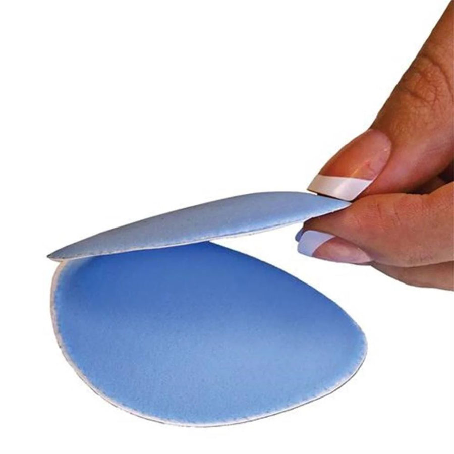Finger holding one piece of the Pedifix Metatarsale Bar PolyPads