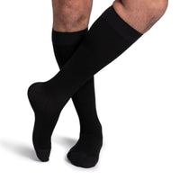 Sigvaris 262 bamboo compression sock knee high front view, in black.