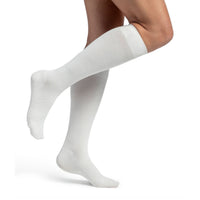 Sigvaris 262 bamboo compression sock knee high side view, in ivory.