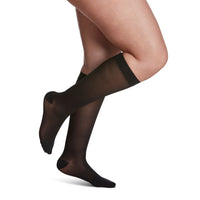 side view of closed toe black sheer compression socks
