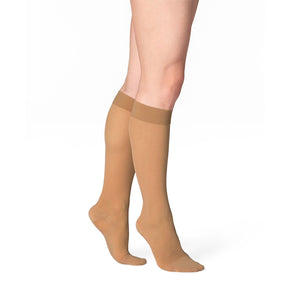 side view of closed toe toasted almond sheer compression socks