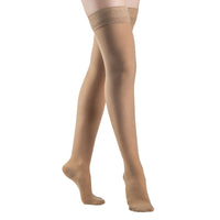 side view of closed toe golden thigh high sheer compression socks