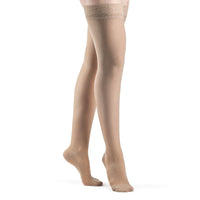 side view of closed toe honey thigh high sheer compression socks