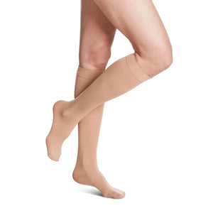 woman wearing midnight blue soft opaque compression pantyhose